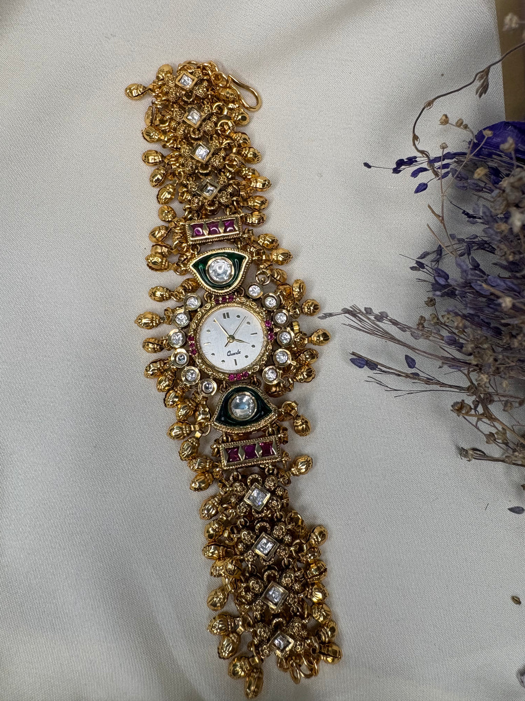 Round Dial Green Heritage Watch with Ghungroo Detailing