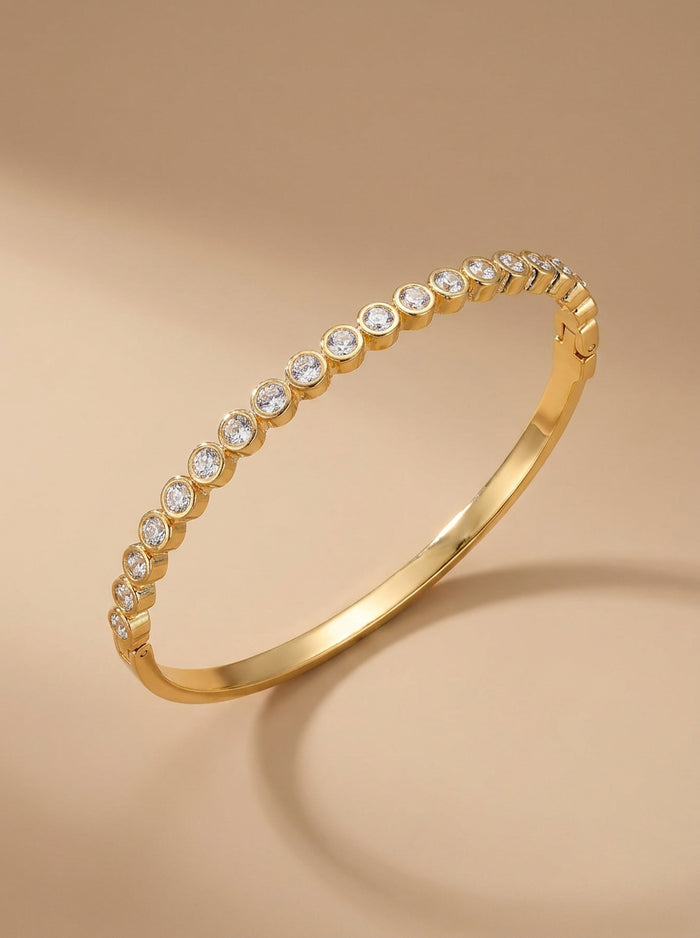 Gold Bangle with Champagne Stone Row