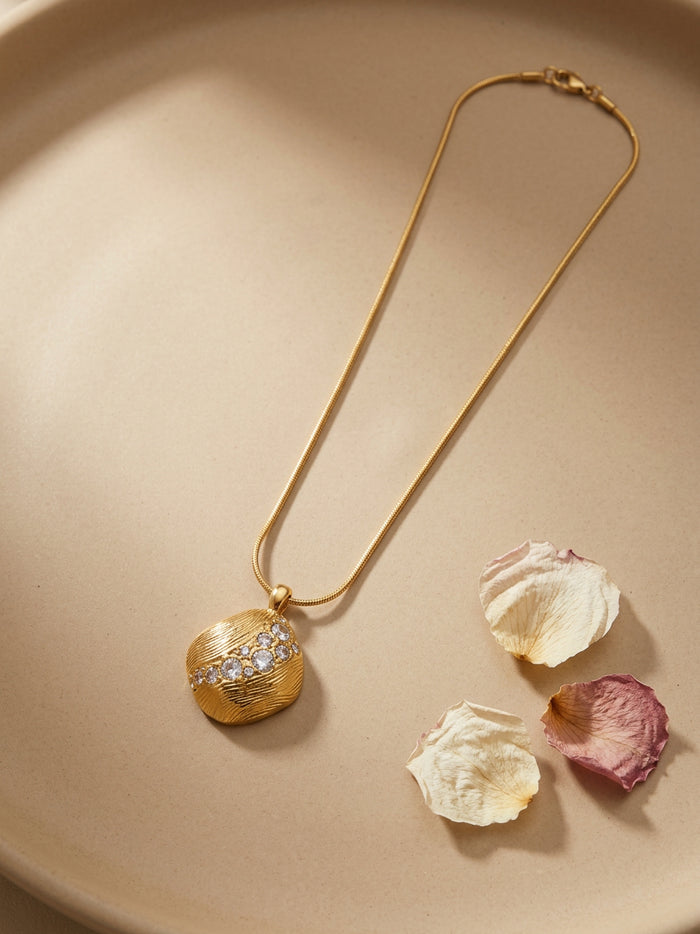 Textured Gold Pendant with Stone Row Necklace