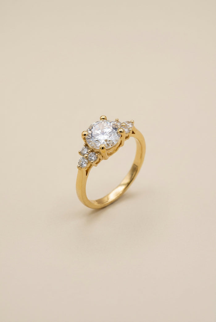 Gold Solitaire Ring with Side Stones