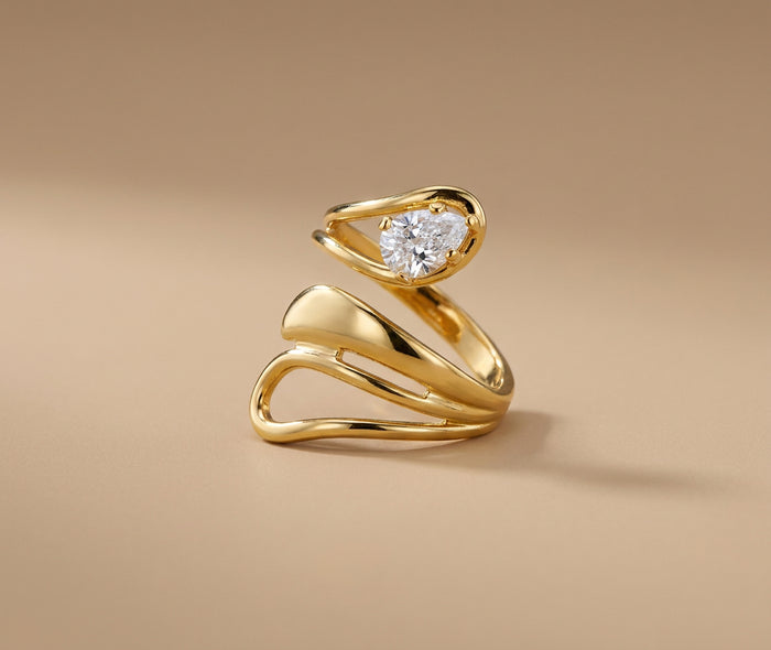 Gold Ribbon Ring with Pear-Cut Crystal