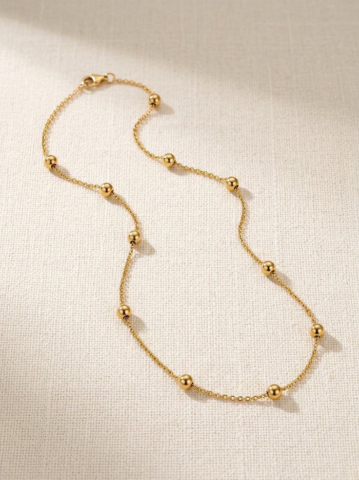 Gold Bead Station Chain Necklace
